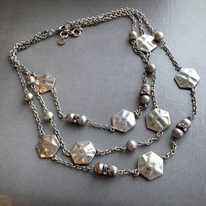 Silver toned multi-strand Mexx necklace with hexagons and metal beads